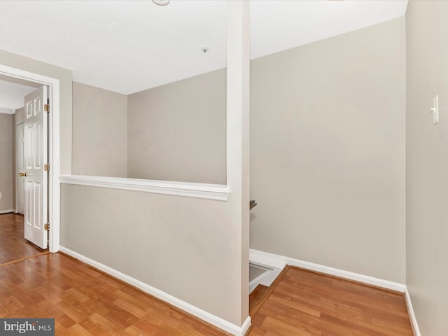 20523 Staffordshire Dr, Germantown, MD 20874 - corridor featuring wood finished floors and baseboards