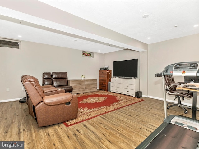 20523 Staffordshire Dr, Germantown, MD 20874 - living area with wood finished floors, baseboards, and recessed lighting