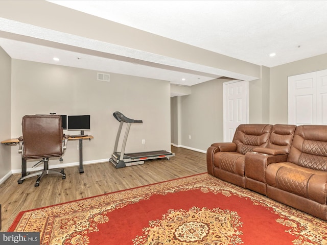 20523 Staffordshire Dr, Germantown, MD 20874 - living area with wood finished floors, baseboards, and recessed lighting