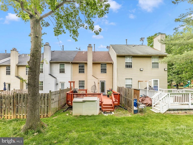 20523 Staffordshire Dr, Germantown, MD 20874 - rear view of house with a deck and a chimney