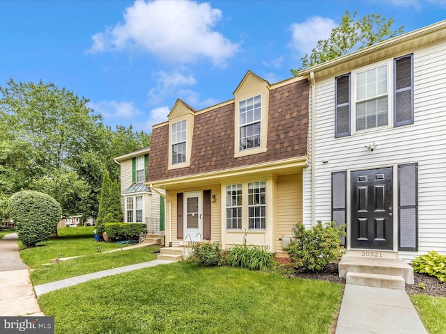 20523 Staffordshire Dr, Germantown, MD 20874 - view of front facade featuring a front yard and a shingled roof