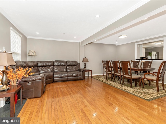 20523 Staffordshire Dr, Germantown, MD 20874 - living room featuring light wood-style flooring, crown molding, and baseboards