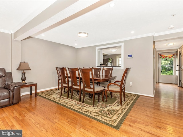 20523 Staffordshire Dr, Germantown, MD 20874 - dining area featuring light wood-type flooring, ornamental molding, and baseboards
