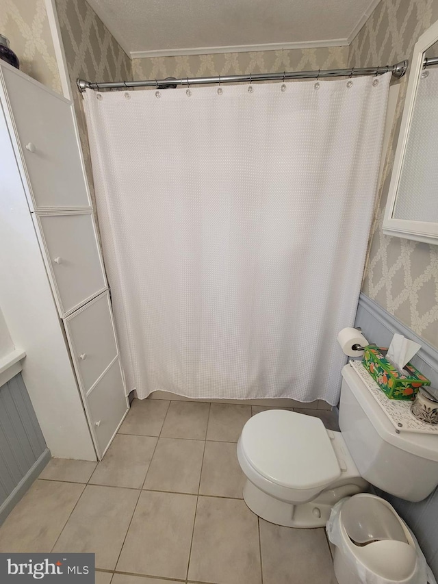 1221 Valley View Rd, Bellefonte, PA 16823 - bathroom with wallpapered walls, toilet, tile patterned floors, and curtained shower