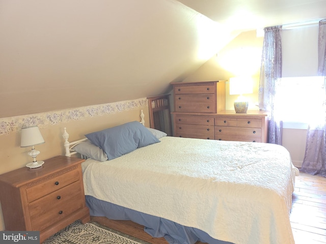 1221 Valley View Rd, Bellefonte, PA 16823 - bedroom featuring wood-type flooring and vaulted ceiling