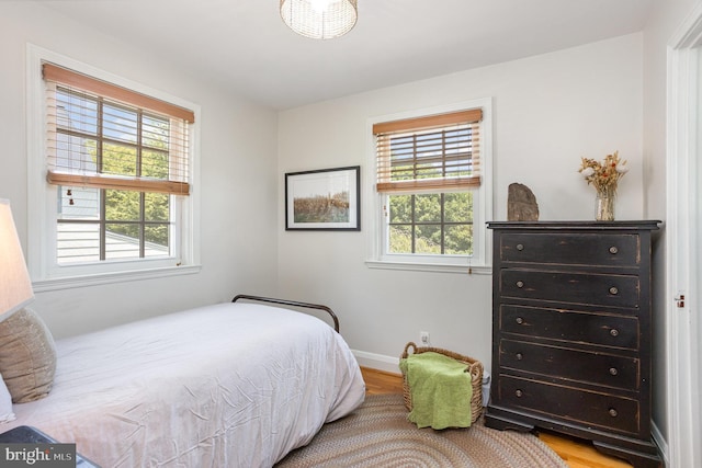 4407 Sedgwick Rd, Baltimore, MD 21210 - bedroom featuring wood finished floors and baseboards