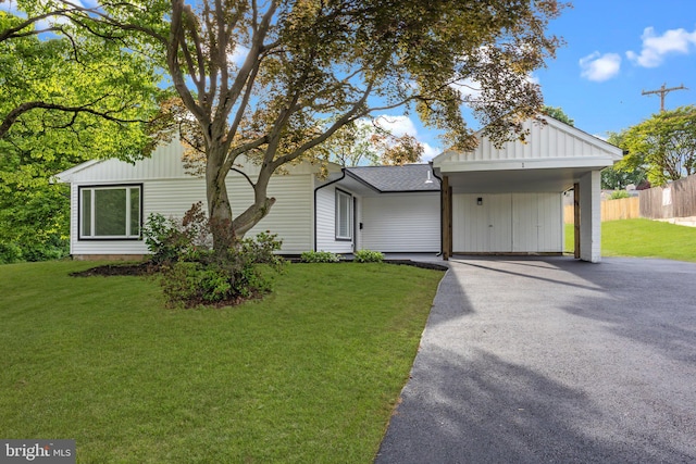 1 Mimosa Ln, Levittown, PA 19054 - view of front of home with asphalt driveway and an attached carport
