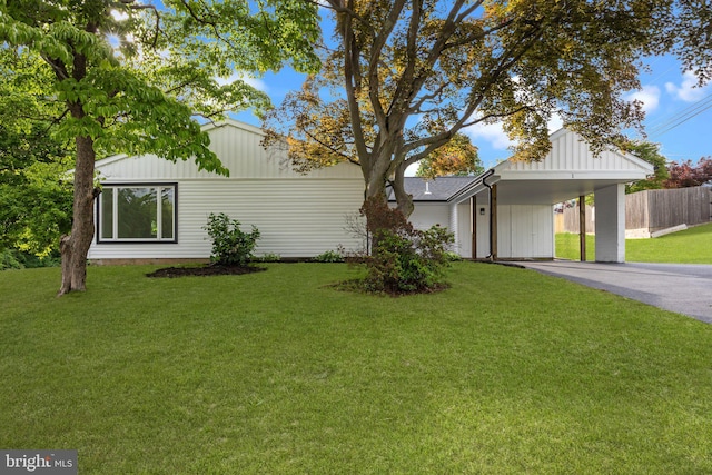 1 Mimosa Ln, Levittown, PA 19054 - view of front of home with asphalt driveway and an attached carport