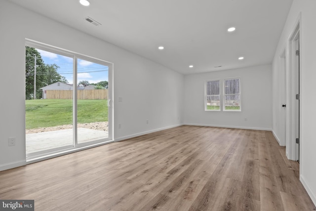 1 Mimosa Ln, Levittown, PA 19054 - unfurnished room with healthy amount of natural light, wood finished floors, recessed lighting, and baseboards
