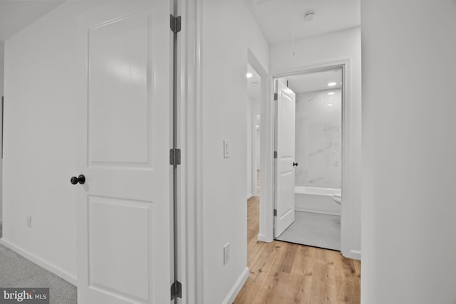 1 Mimosa Ln, Levittown, PA 19054 - hallway featuring attic access, light wood-style floors, and baseboards