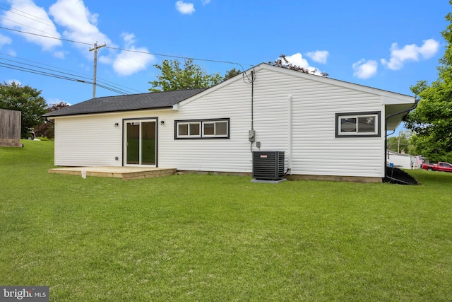1 Mimosa Ln, Levittown, PA 19054 - rear view of property featuring central air condition unit and a yard