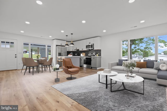 1 Mimosa Ln, Levittown, PA 19054 - living room featuring healthy amount of natural light, light wood-type flooring, and recessed lighting