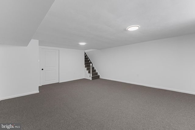937 E Durard St, Philadelphia, PA 19150 - finished below grade area with stairway, baseboards, and dark carpet