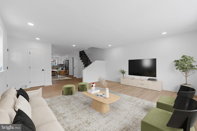 937 E Durard St, Philadelphia, PA 19150 - living room with stairway, wood finished floors, recessed lighting, and baseboards