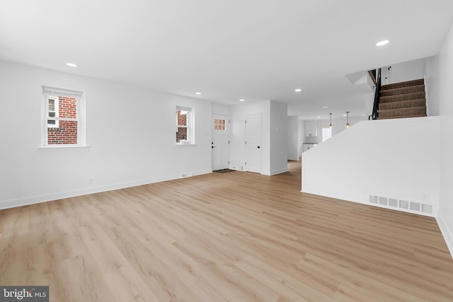 937 E Durard St, Philadelphia, PA 19150 - unfurnished living room with stairs, recessed lighting, light wood-type flooring, and baseboards