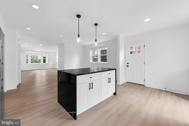 937 E Durard St, Philadelphia, PA 19150 - kitchen featuring light wood-style floors, dark countertops, open floor plan, recessed lighting, and decorative light fixtures