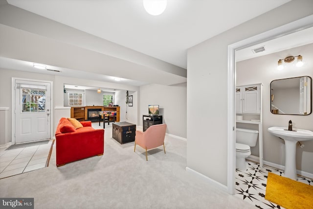 12794 Silvia Loop, Woodbridge, VA 22192 - living room with a glass covered fireplace and carpet flooring