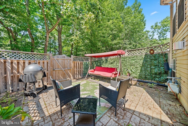 12794 Silvia Loop, Woodbridge, VA 22192 - fenced backyard featuring a gate and a patio