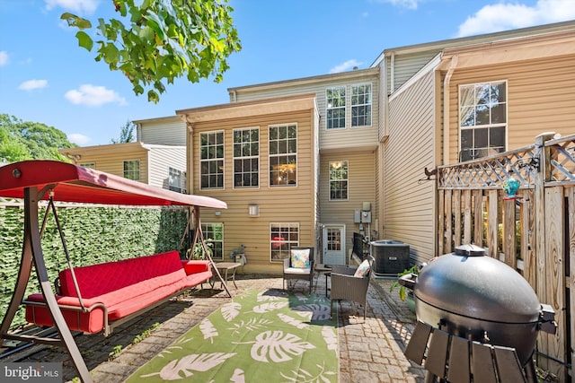 12794 Silvia Loop, Woodbridge, VA 22192 - rear view of property featuring a patio area and an outdoor hangout area