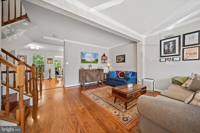 12794 Silvia Loop, Woodbridge, VA 22192 - living room with stairs, wood finished floors, and crown molding