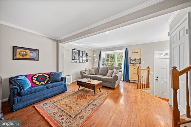 12794 Silvia Loop, Woodbridge, VA 22192 - living area featuring ornamental molding, wood finished floors, and stairway
