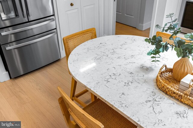 5 Tall Tree Ct, Baltimore, MD 21208 - kitchen with refrigerator and light wood-style floors