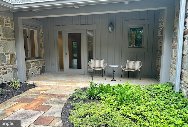5 Tall Tree Ct, Baltimore, MD 21208 - property entrance featuring stone siding and board and batten siding