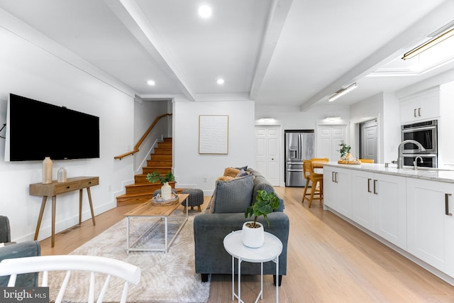 5 Tall Tree Ct, Baltimore, MD 21208 - living area featuring beamed ceiling, stairs, light wood-style floors, and recessed lighting