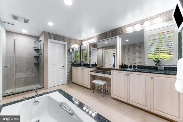 5 Tall Tree Ct, Baltimore, MD 21208 - bathroom with vanity, a stall shower, a jetted tub, and tile patterned floors