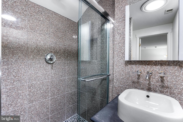 5 Tall Tree Ct, Baltimore, MD 21208 - full bathroom featuring a stall shower and tile walls