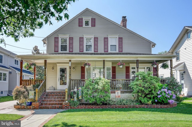 236 Ardmore Ave, Haddonfield, NJ 08033 - view of front of property featuring a porch, a front yard, and a chimney