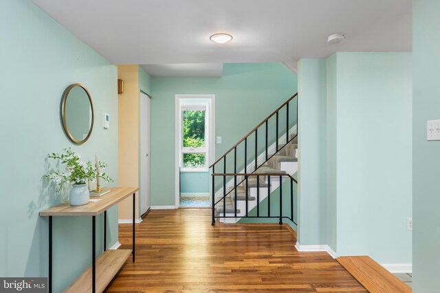 5305 Thunder Hill Rd, Columbia, MD 21045 - entrance foyer featuring wood finished floors, baseboards, and stairs