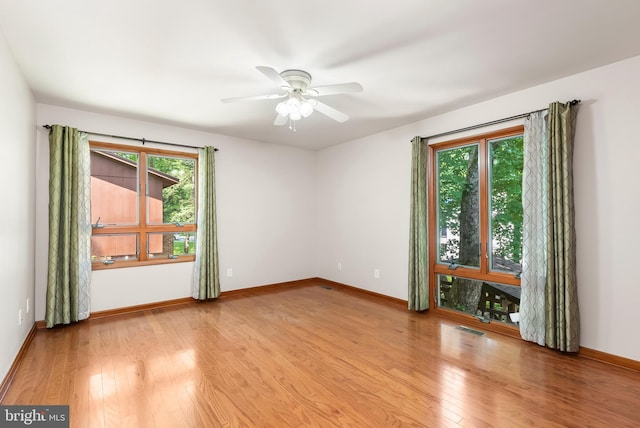 5305 Thunder Hill Rd, Columbia, MD 21045 - unfurnished room with wood finished floors, baseboards, and ceiling fan