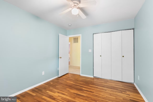 5305 Thunder Hill Rd, Columbia, MD 21045 - unfurnished bedroom featuring wood finished floors and baseboards