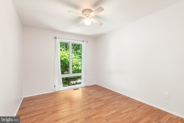 5305 Thunder Hill Rd, Columbia, MD 21045 - unfurnished room with a ceiling fan, light wood finished floors, and baseboards