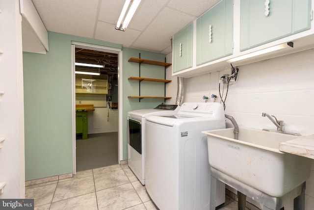 5305 Thunder Hill Rd, Columbia, MD 21045 - washroom featuring cabinet space, washing machine and clothes dryer, and electric panel