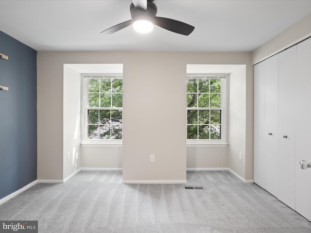 108 Bickel Ct, Sterling, VA 20165 - unfurnished bedroom featuring multiple windows, carpet flooring, and baseboards
