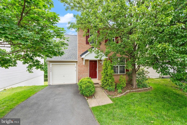 45620 Livingstone Station St, Sterling, VA 20166 - view of front of house featuring brick siding, driveway, a garage, a front lawn, and a shingled roof