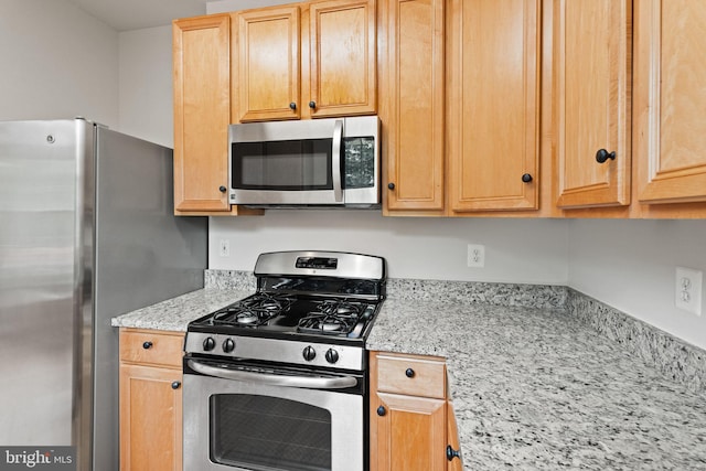 45620 Livingstone Station St, Sterling, VA 20166 - kitchen with stainless steel appliances and light stone countertops