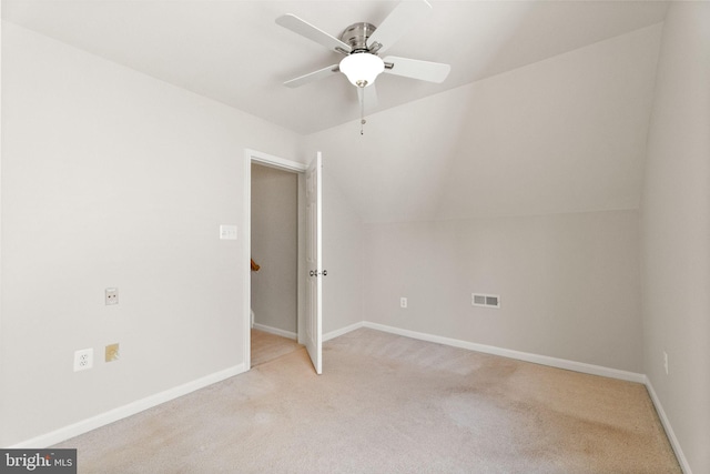 45620 Livingstone Station St, Sterling, VA 20166 - spare room with a ceiling fan, light carpet, vaulted ceiling, and baseboards