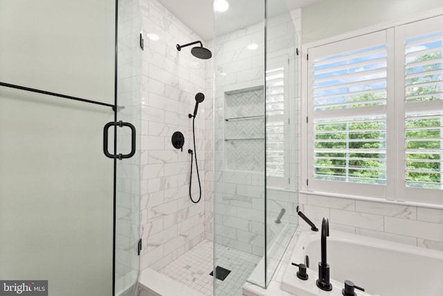 45620 Livingstone Station St, Sterling, VA 20166 - bathroom featuring a bath and a shower stall