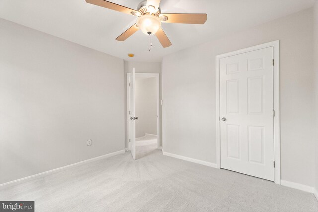 45620 Livingstone Station St, Sterling, VA 20166 - unfurnished bedroom featuring carpet, baseboards, and a ceiling fan