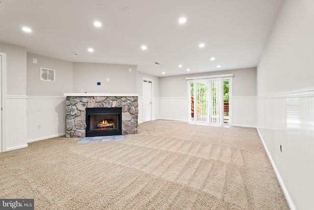45620 Livingstone Station St, Sterling, VA 20166 - unfurnished living room with a fireplace, recessed lighting, carpet, and a wainscoted wall