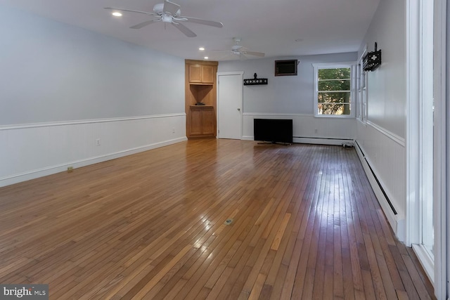172 Chippewa Trl, Medford Lakes, NJ 08055 - unfurnished living room with light wood-type flooring, ceiling fan, a baseboard radiator, and baseboards