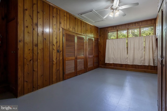 172 Chippewa Trl, Medford Lakes, NJ 08055 - spare room with ceiling fan, attic access, wooden walls, and tile patterned floors