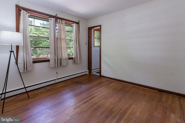 172 Chippewa Trl, Medford Lakes, NJ 08055 - empty room with wood finished floors, baseboards, and baseboard heating