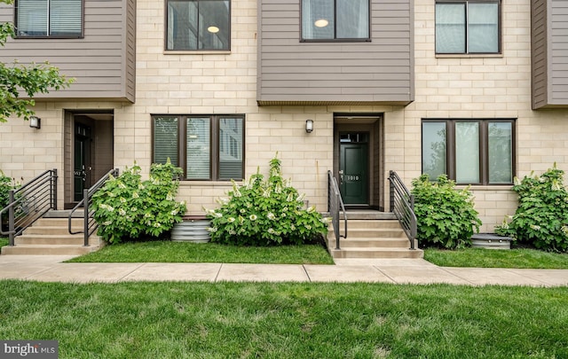 1009 Lakeview Ct Unit 1009, King Of Prussia, PA 19406 - property entrance featuring a lawn