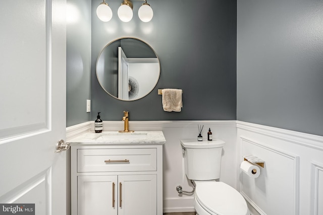 1009 Lakeview Ct Unit 1009, King Of Prussia, PA 19406 - bathroom featuring toilet, vanity, and wainscoting