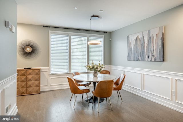 1009 Lakeview Ct Unit 1009, King Of Prussia, PA 19406 - dining space with wainscoting, a decorative wall, and wood finished floors