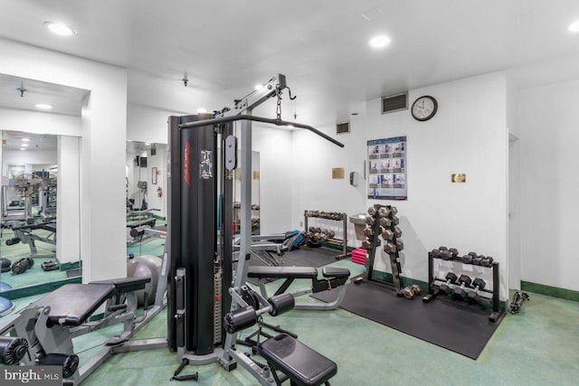 workout area with recessed lighting and baseboards